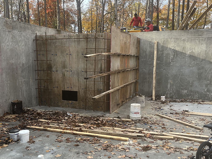 pic 2 concrete basement with safe room