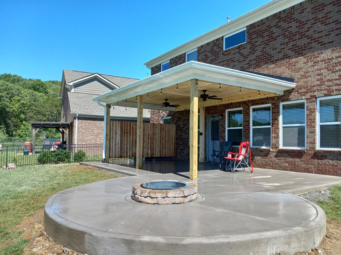 Roof extension view with patio and fire pit